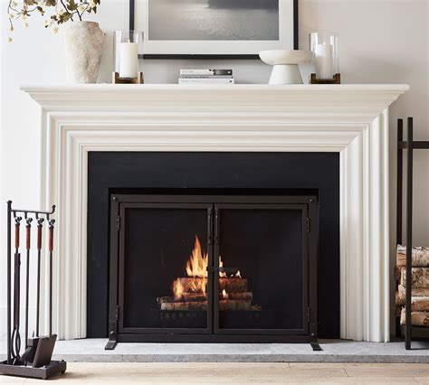 Stick to a simple color palette one to three colors tops to prevent your design from looking too busy. . Pottery barn fireplace